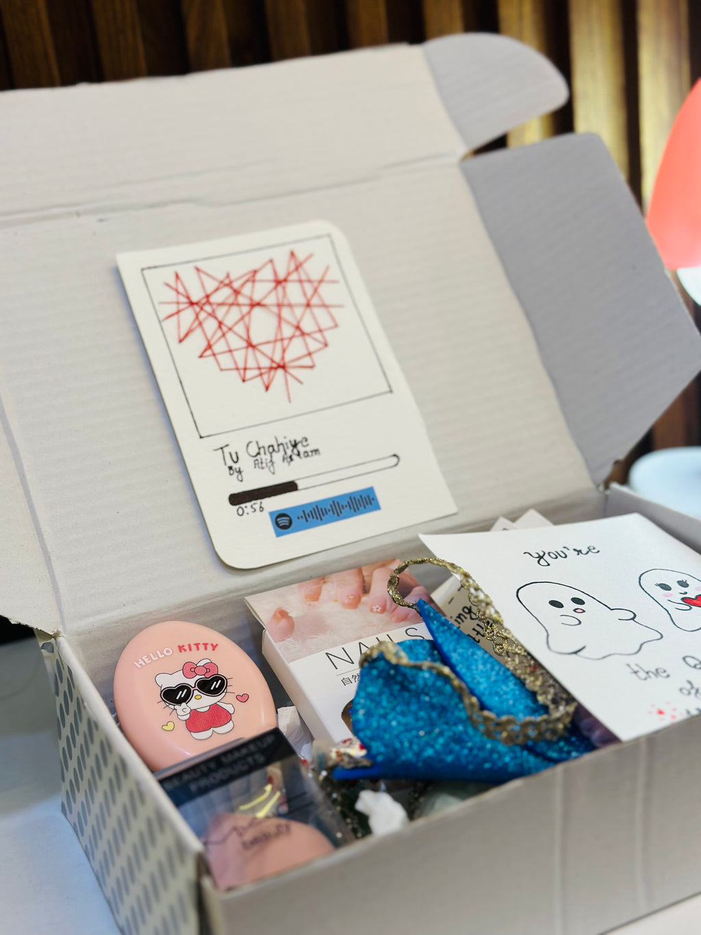 Tu Chahiye Hamper – kraft gift box with kawaii comb, blender, press-on nails, chocolates in cute bag, lip gloss, scrunchie, earrings, clutcher, rubber bands, and handmade notes – perfect girlfriend gift"

