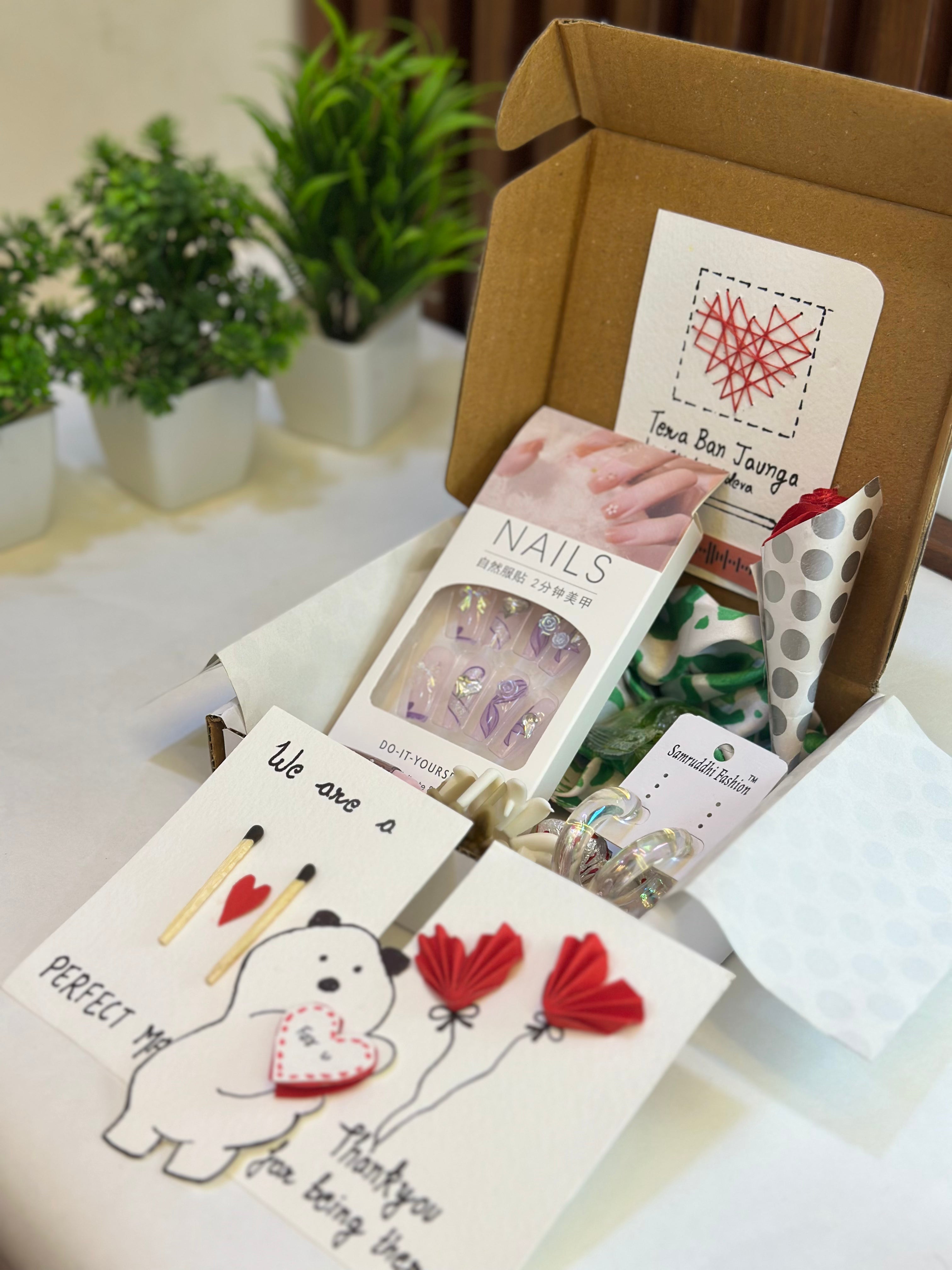 Tera Ban Jaunga Hamper – gift box with pastel press-on nail set, kawaii lip gloss, earrings, chocolates, handmade notes, clutcher, and scrunchie – cute gift for girlfriend day or romantic surprise"

